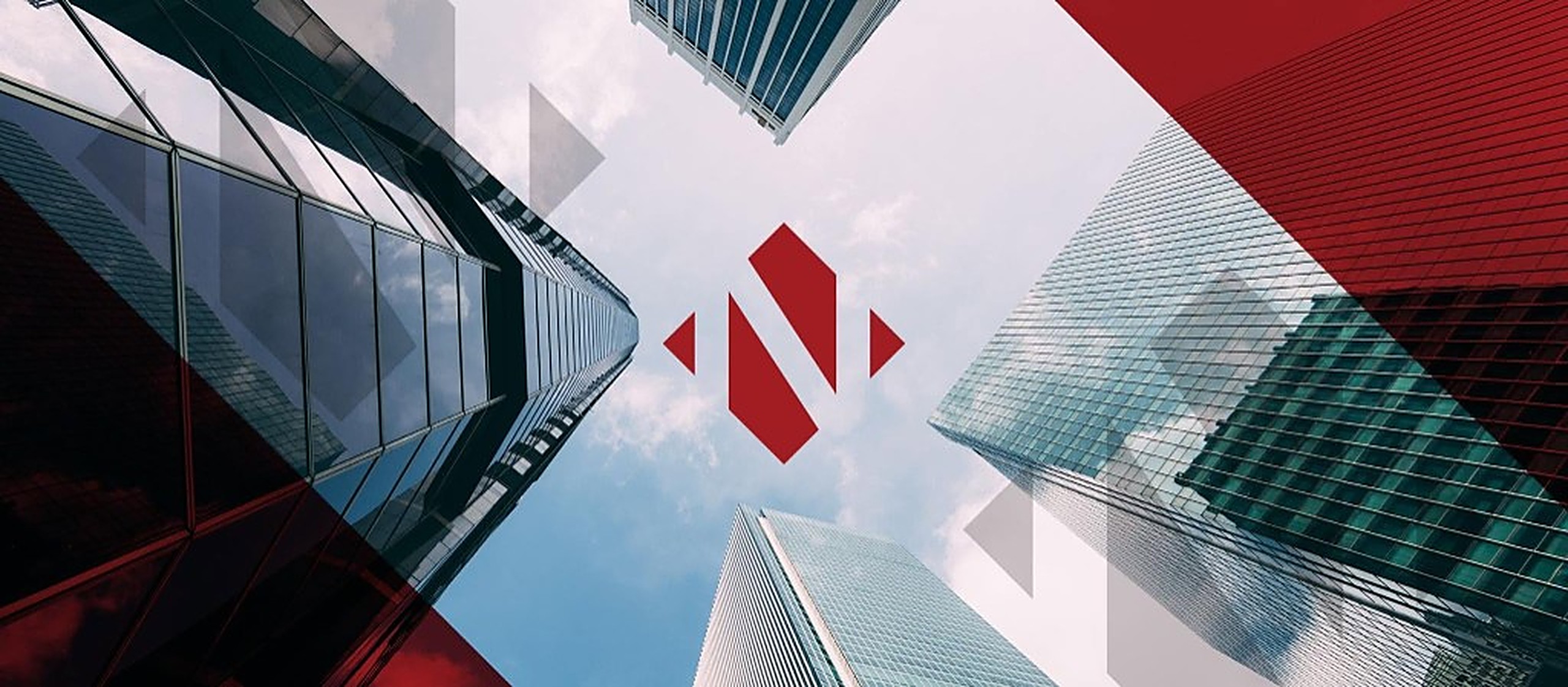 Glass towers viewed from below, with the New Concept Security mark
